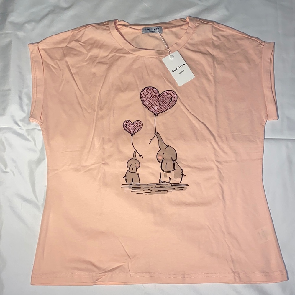 really cute elephant shirts with Shiny gems really light and fresh material